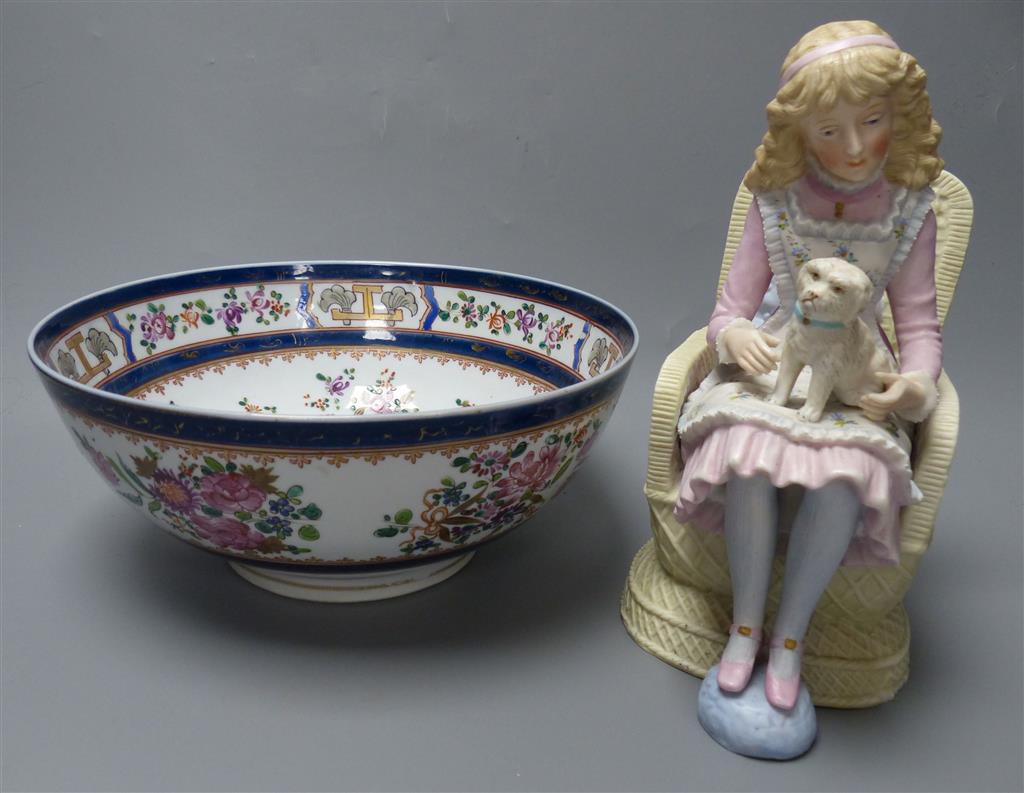 A French coloured biscuit porcelain figure of a seated girl and a Samson armorial bowl, c.1900, diameter 23cm